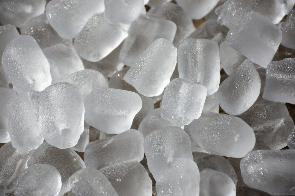 A heap of clear ice cubes, close up