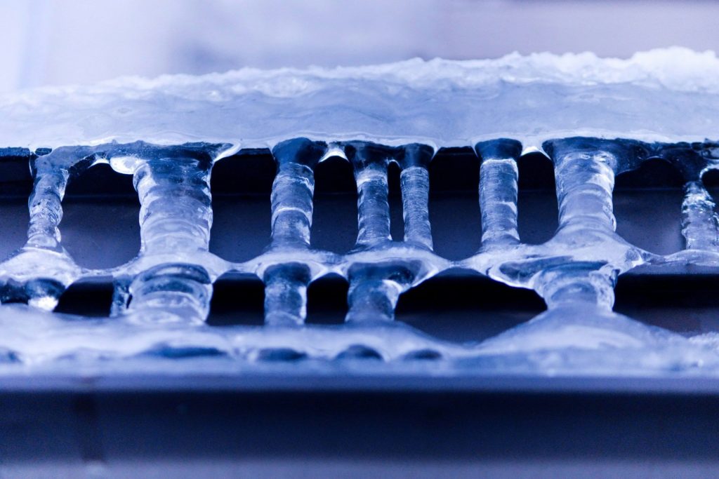 An evaporator coil packed solid with ice