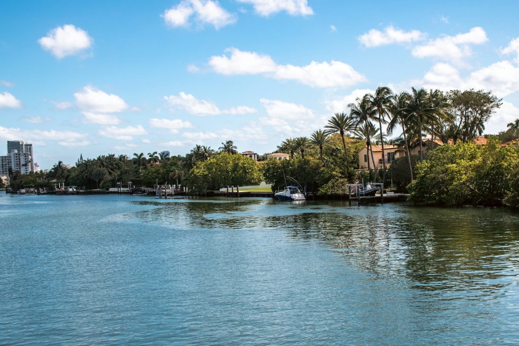 Large older houses across a wide bay