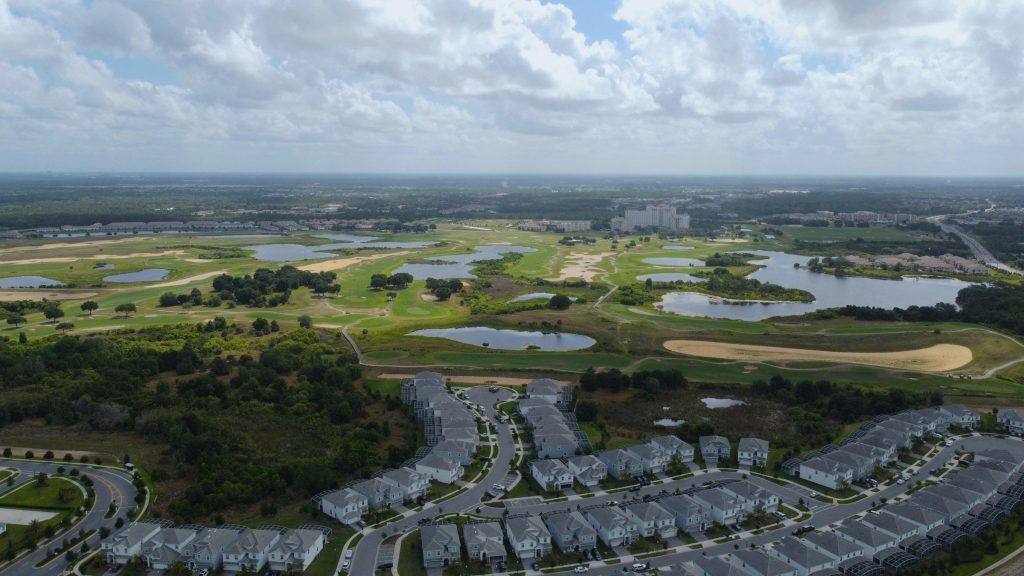 Townhouses along a golf course and its lakes