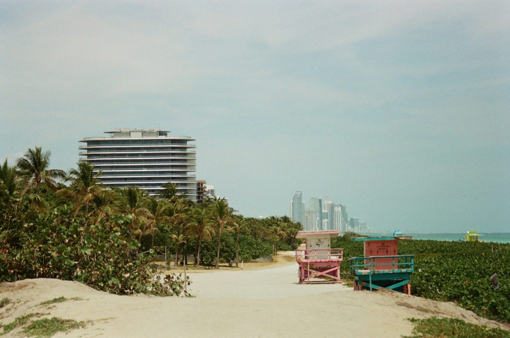 A long apartment block behind the dune