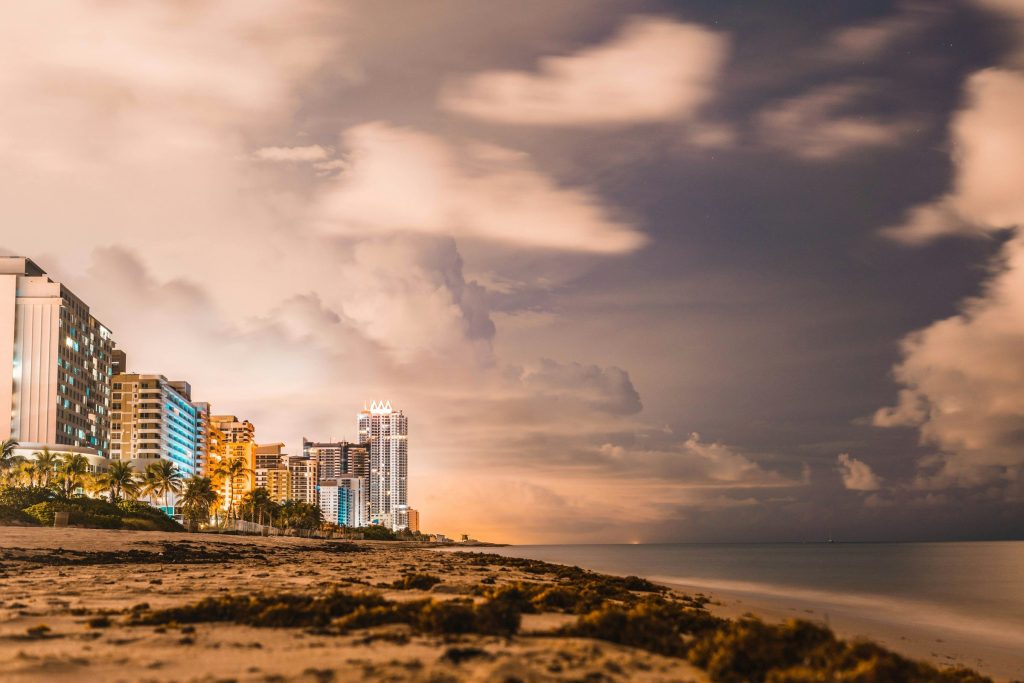 City skyline under cloudy sky during daytime