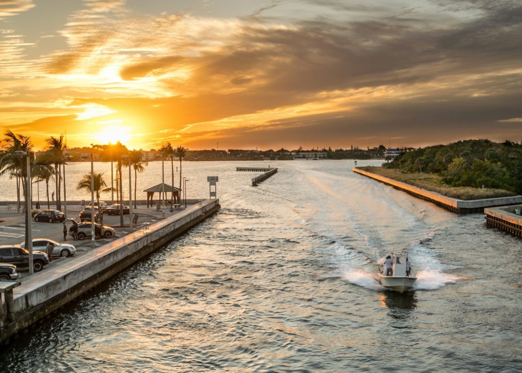 A boat leaving an inlet