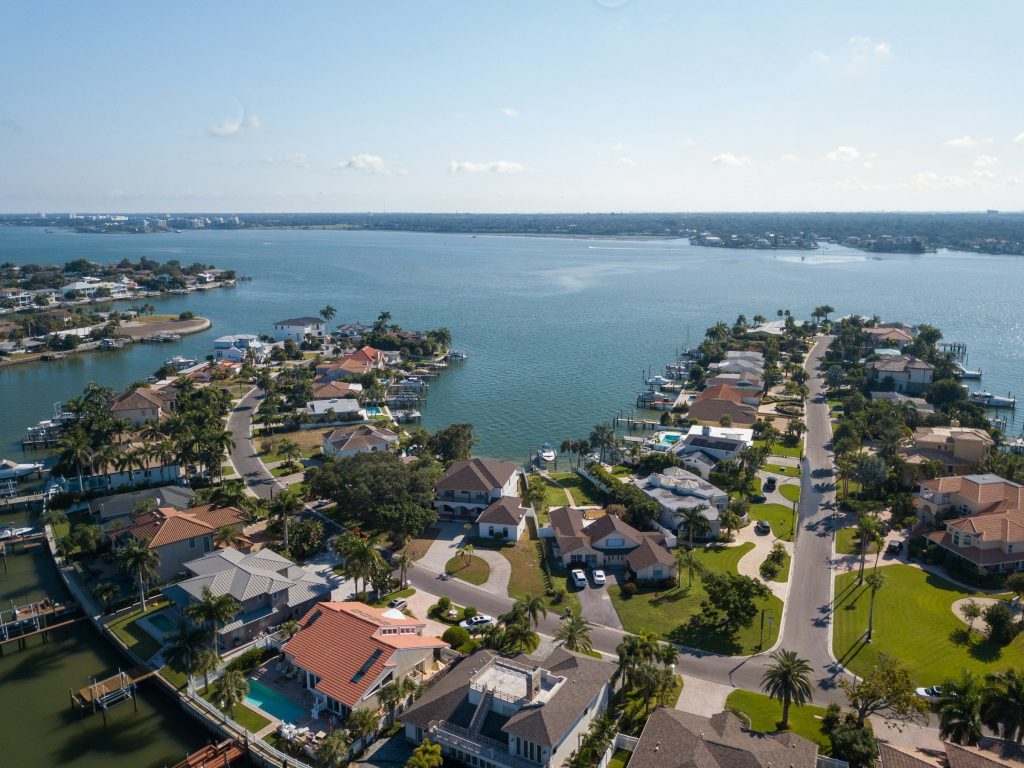 A large body of water surrounded by houses