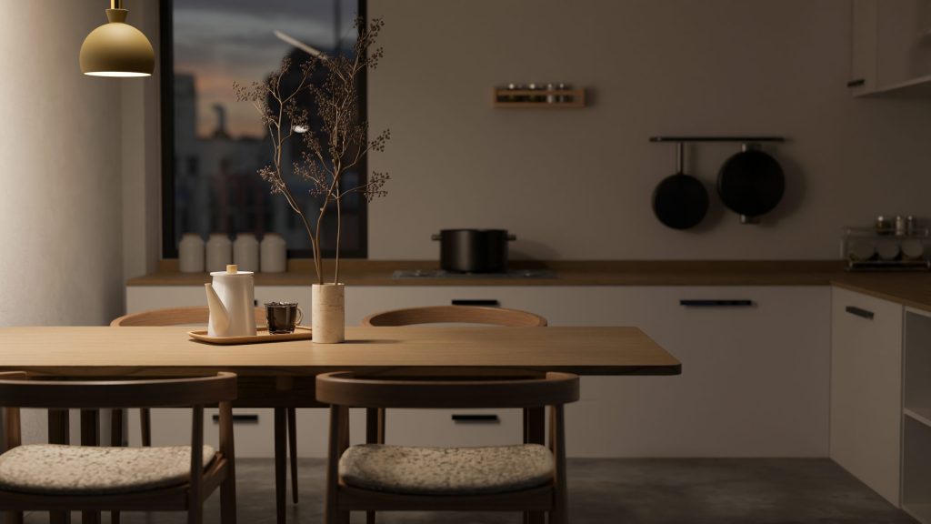 A warm evening kitchen, a wooden dining table in front of a pale run of units